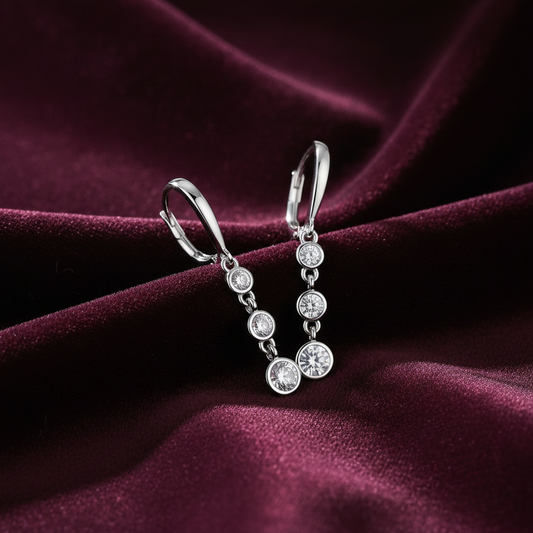 arcana classic moissanite drop earrings in S925 silver featuring a delicate chain design on deep burgundy velvet