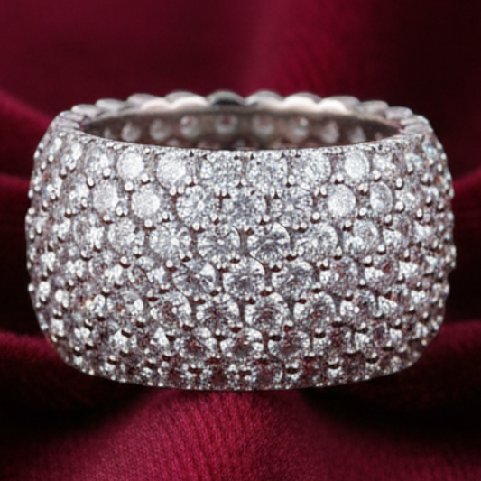 arcana wide multi-row moissanite ring crafted in S925 silver, featuring pavé-set stones on a deep red velvet background